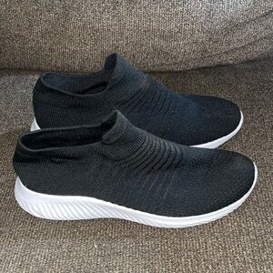 Black slip on tennis shoes